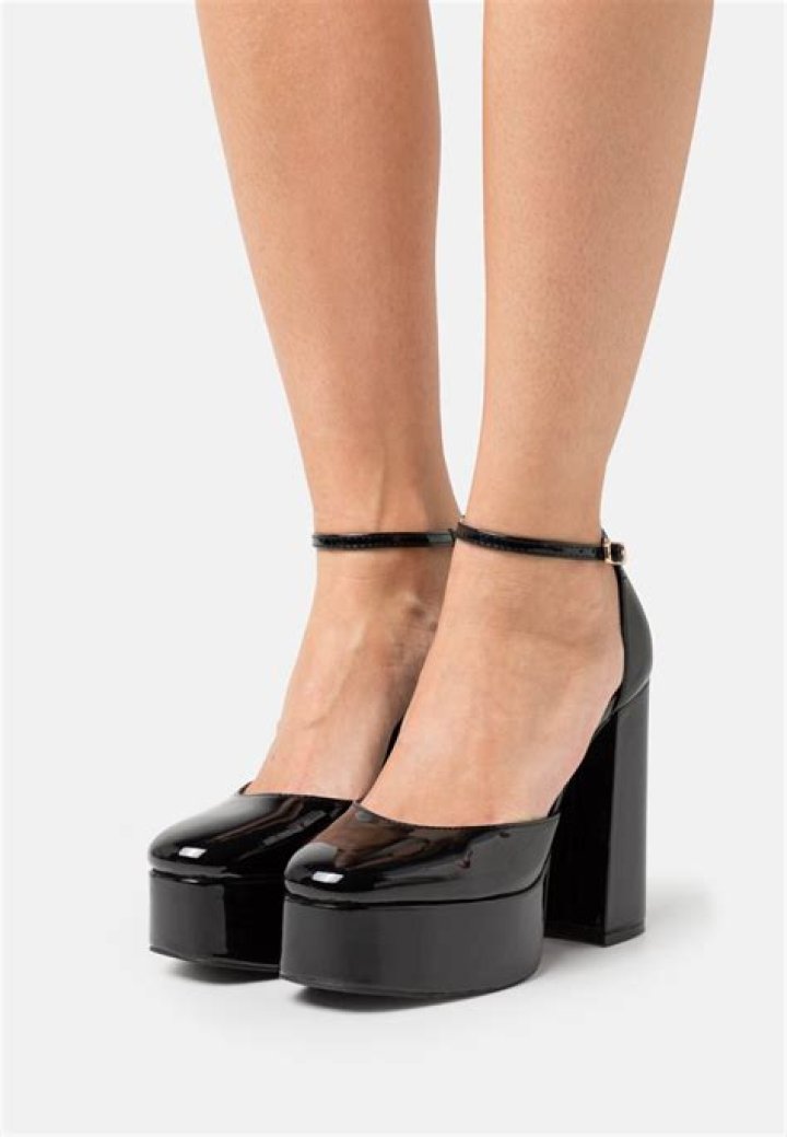 A black platform shoe.