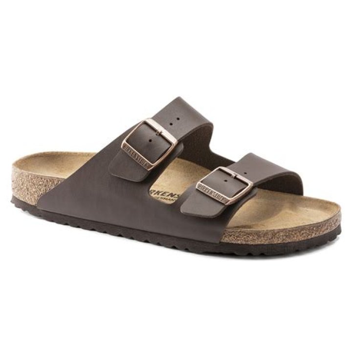 A dark brown Birkenstock Arizona soft footbed sandal