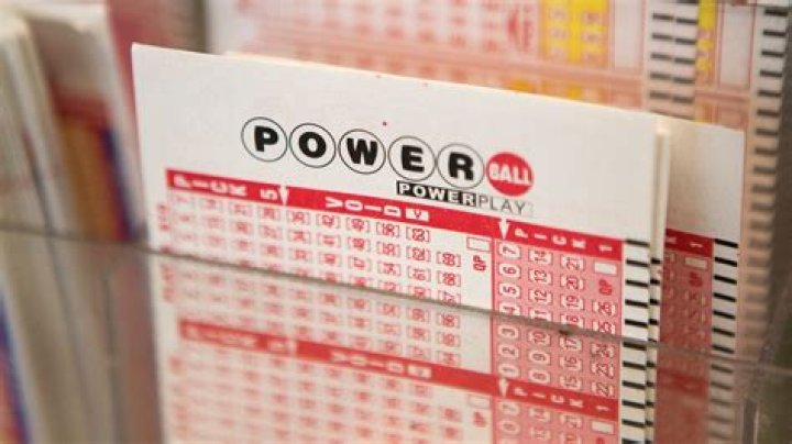A Powerball lottery tickets are printed out of a lottery machine at a convenience store, in Chicago. The jackpot jumps to an estimated $570 million for Saturday's drawing. That would make it the nation's 8th largest lottery prize ever Powerball Jackpot, Chicago, USA - 06 Jan 2018