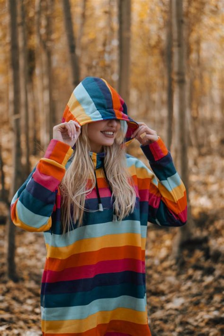 A woman wearing a hoodie