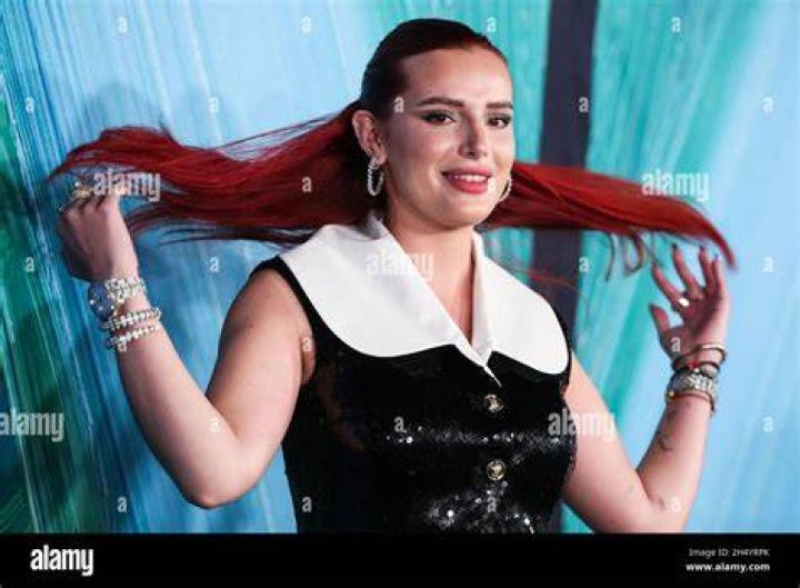 Actress Bella Thorne wearing Giambattista Valli arrives at the amfAR Gala Los Angeles 2021 honoring TikTok and Jeremy Scott held at the Pacific Design Center on November 4, 2021 in West Hollywood, Los Angeles, California, United States. AmfAR Gala Los Angeles 2021, West Hollywood, United States - 04 Nov 2021