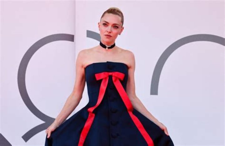 Amanda Seyfried poses on the TIME100 red carpet