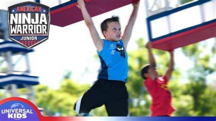 AMERICAN NINJA WARRIOR JUNIOR -- Season: 1 -- Pictured: (l-r) Matt Iseman, Laurie Hernandez, Akbar Gbaja-Biamila -- (Photo by: Chris Haston/Universal Kids)