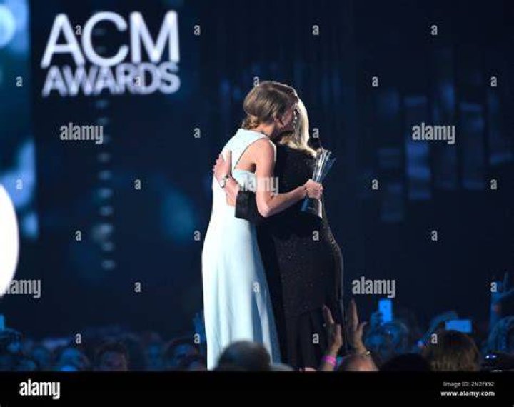 Andrea Finlay, right, presents the milestone award to Taylor Swift at the 50th annual Academy of Country Music Awards at AT&T Stadium, in Arlington, Texas 50th Annual Academy Of Country Music Awards - Show, Arlington, USA