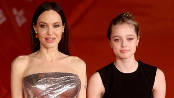 Angelina Jolie is comfy and cozy in navy and white