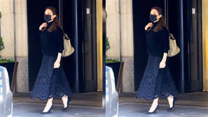 Angelina Jolie Rocks Black Turtleneck & Matching Skirt At LAX After Meeting With U.S. Gymnasts