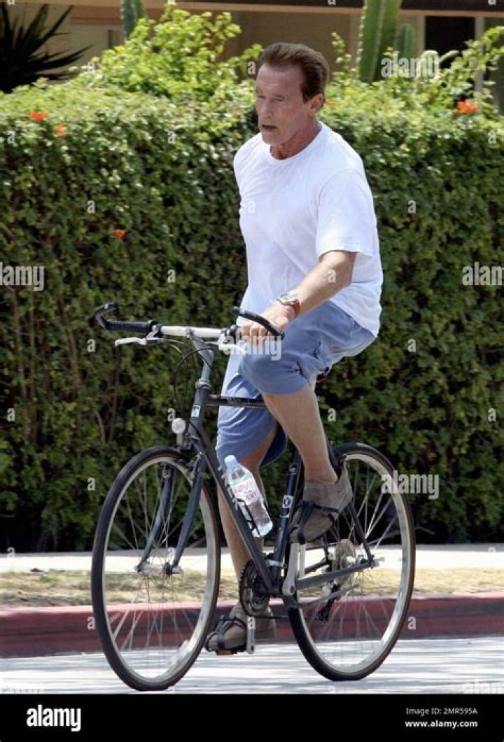 Arnold Schwarzenegger rides a bike with his son Joseph Baena Arnold Schwarzenegger out and about, Los Angeles, USA - 19 Jul 2020