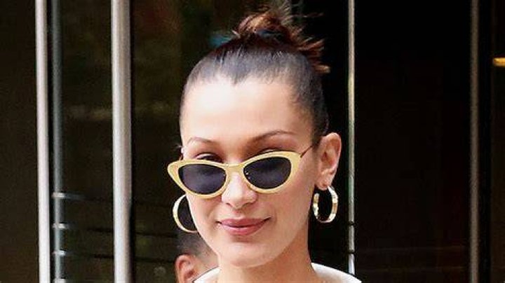 Bella Hadid Rocks A Very Unbuttoned Blouse While Quarantined With Pregnant Sister Gigi & Zayn