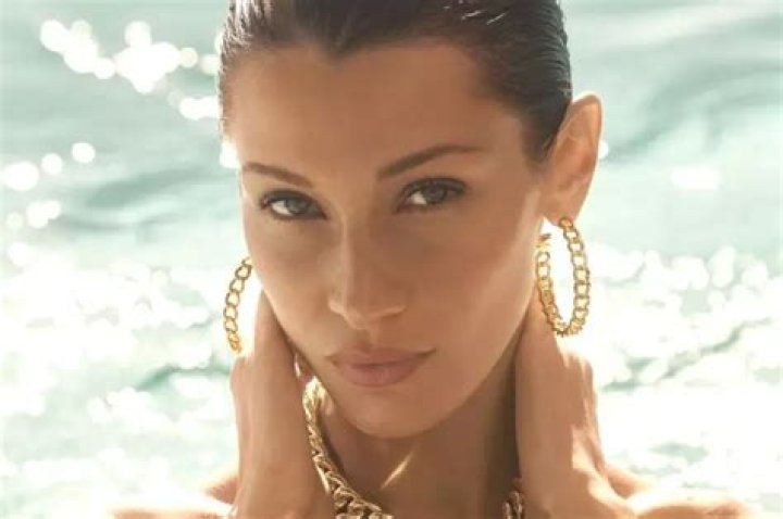Bella Hadid Slays In Back-To-Back Tie Dye Bikinis After Celebrating 24th Birthday — Watch