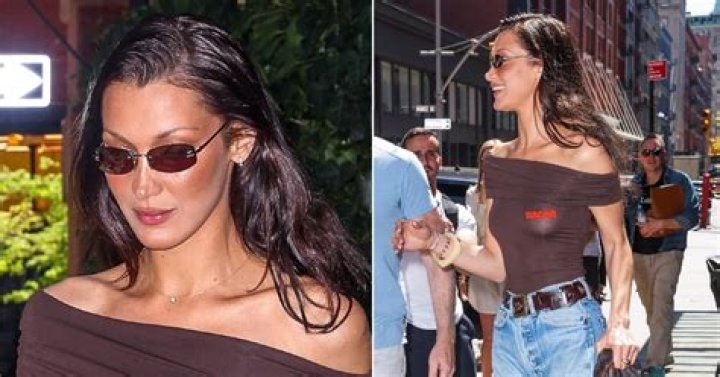 Bella Hadid wears a leopard print bikini with a red cowboy hat and mini skirt as she hits the beach in Miami. 13 Nov 2021 Pictured: Bella Hadid. Photo credit: MEGA TheMegaAgency.com +1 888 505 6342 (Mega Agency TagID: MEGA805068_001.jpg) [Photo via Mega Agency]