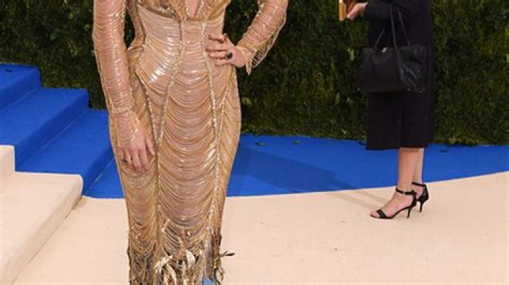 Blake Lively’s Dress At Met Gala — Slays In Gold Gown & Feather Train – Hollywood Life