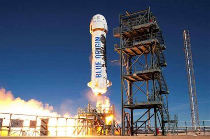 Blue Origin's New Shepard suborbital rocket remains on schedule to launch on its 16th flight to space and its first with astronauts on board on Tuesday, July 20, 2021, from Launch Site One, 160 miles east of El Paso, Texas. Founder Jeff Bezos, second from left, will be accompanied aboard the flight by his brother Mark Bezos, left, 82-year-old aviator Wally Funk, seated, and 18-year-old Oliver Daemen, right, of the Netherlands. Funk and Daemen will become the oldest and youngest people to fly in space, respectively. Daemen will also become the first paying customer Blue Origin will send into space.Blue Origin's New Shepard Rocket Prepares for First Crewed Launch, Washington, District of Columbia, United States - 20 Jul 2021