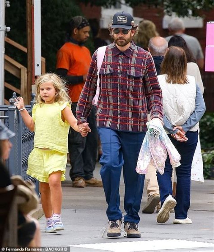 Bradley Cooper Holds Hands With Daughter Lea, 5, In NYC After Revealing He Still Lives With His Mom: Photos