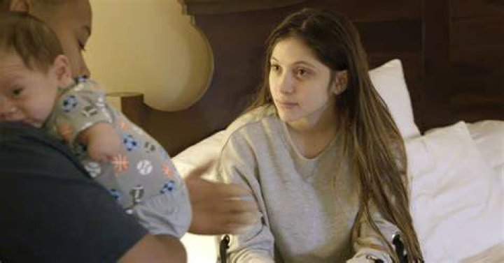 Brianna Jaramillo holding her baby during a scene