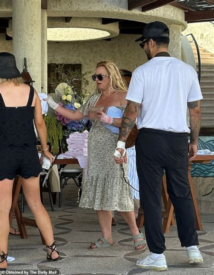 Britney Spears, 40, Writhes Around In A Bikini On The Beach: Watch
