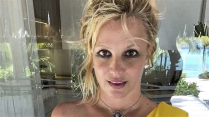 Britney Spears Shares Flirty Pool Day Video in Tiny String Bikini With Manager Benjamin Mallin