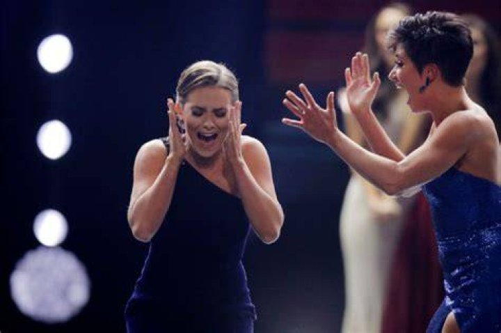 Camille Schrier, of Virginia, reacts reacts as she is crowned after winning the Miss America competition at the Mohegan Sun casino in Uncasville, Conn.,. At rear is 2019 Miss. America Nia Franklin Miss America, Uncasville, USA - 19 Dec 2019