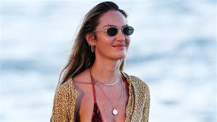 Candice Swanepoel Sizzles In Striped Bikini Amid Reports She’s ‘Dating’ Kanye West