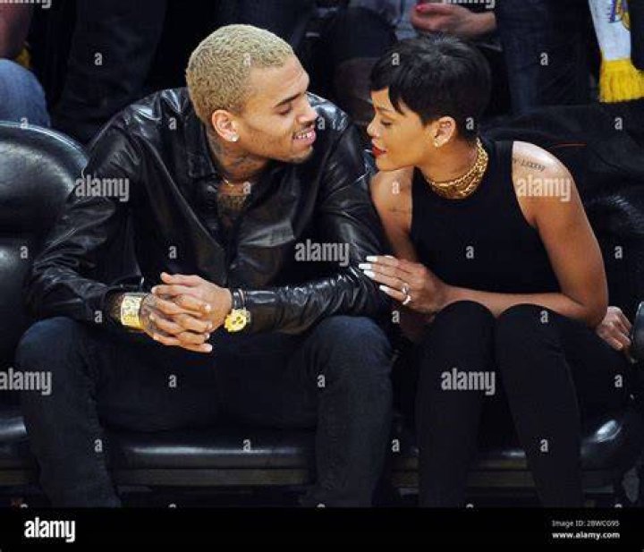 Chris Brown and Rihanna laugh and snuggle as they make their 1st public appearance together since their very public break up as they attend the Los Angeles Lakers Vs The New York Knicks Basketball Game at the Staoles Center in Los Angeles, Ca Pictured: Chris Brown and Rihanna,Chris Brown Rihanna Ref: SPL474572 261212 NON-EXCLUSIVE Picture by: SplashNews.com Splash News and Pictures Los Angeles: 310-821-2666 New York: 212-619-2666 London: +44 (0)20 7644 7656 Berlin: +49 175 3764 166 World Rights