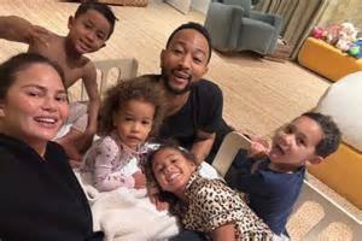 Chrissy Teigen, John Legend and their kids, Luna and Miles, pose with Minnie Mouse while celebrating Luna's birthday at Disneyland Park in Anaheim, Calif., April 14, 2022. The family enjoyed multiple attractions, including a voyage on 'it's a small world', complete with a cast of nearly 300 audio-animatronics dolls representing children from every corner of the globe singing the classic anthem. Chrissy Teigen and John Legend celebrate Daughter Luna's Birthday at Disneyland Resort, Anaheim, California, USA - 14 Apr 2022