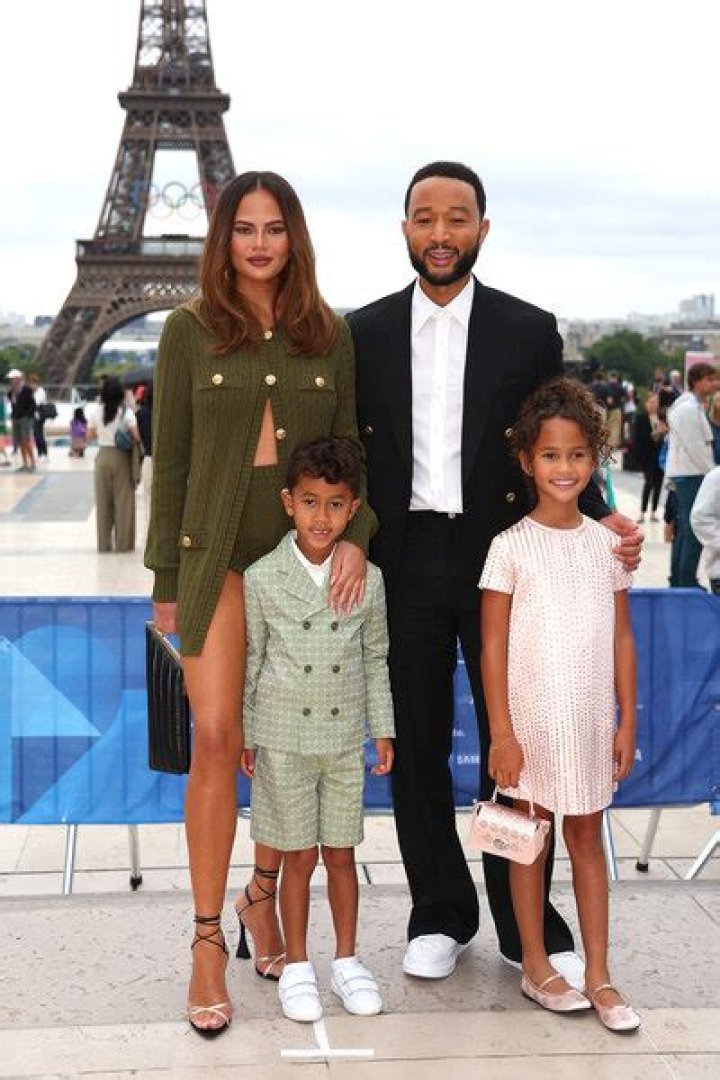 Chrissy Teigen playing with her kids