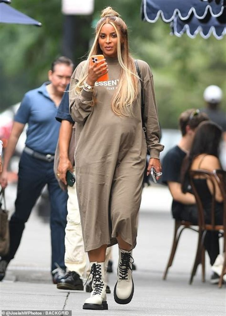 Ciara Shows Off Her Growing Baby Bump In A Sexy Little Black Dress At NYFW