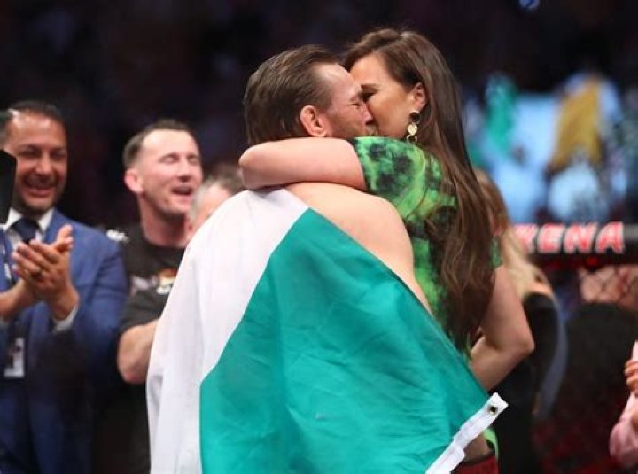 Conor McGregor celebrates with girlfriend Dee Devlin after defeating Chad Mendes during their interim featherweight title mixed martial arts bout at UFC 189, in Las Vegas UFC 189 Mixed Martial Arts, Las Vegas, USA