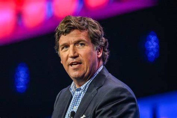 Conservative political commentator Tucker Carlson arrives for the 60th anniversary celebration of NBC's Meet the Press at the Newseum in Washington, Wednesday, Nov. 14, 2007. (AP Photo/Charles Dharapak)