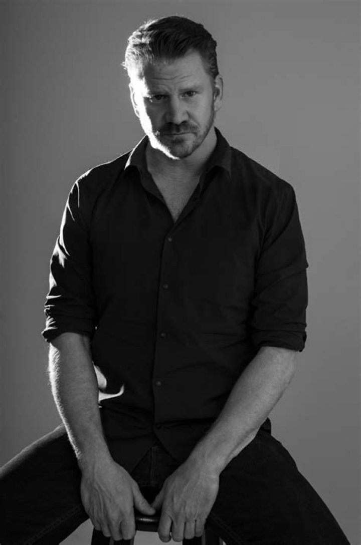 Dash Mihok Poses For A Photo