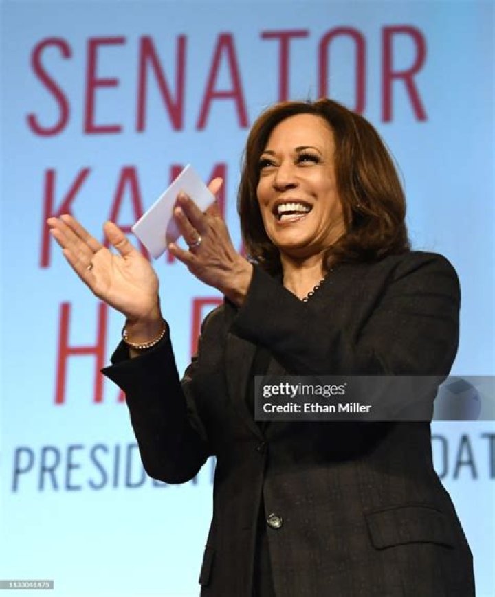 Democratic presidential candidate Sen. Kamala Harris, D-Calif., laughs as CNN moderator Chris Cuomo speaks during the Power of our Pride Town Hall Thursday, Oct. 10, 2019, in Los Angeles. The LGBTQ-focused town hall featured nine 2020 Democratic presidential candidates. (AP Photo/Marcio Jose Sanchez)