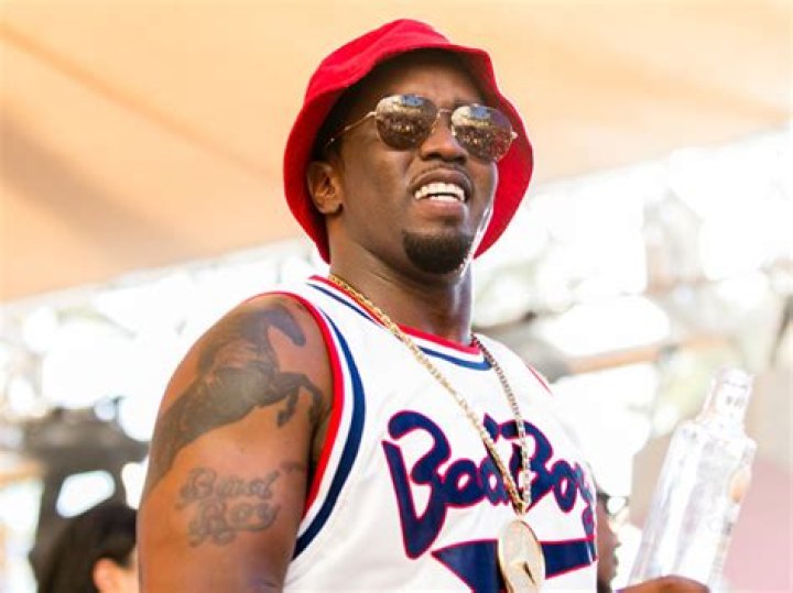 Diddy Swims With His Adorable Little Girl Love, 4 Mo, In Daddy-Daughter Moment