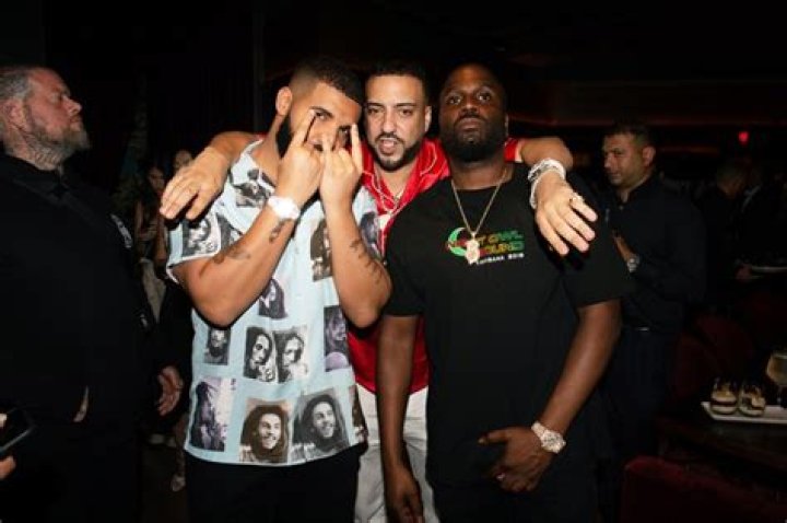 Drake and French Montana having a good time at an event
