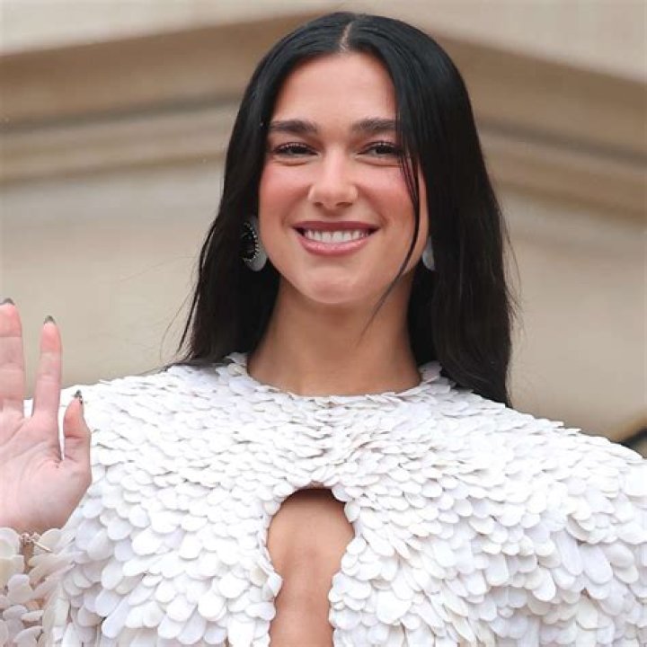 Dua Lipa & More Celebs Arrive For The Versace Show In Los Angeles