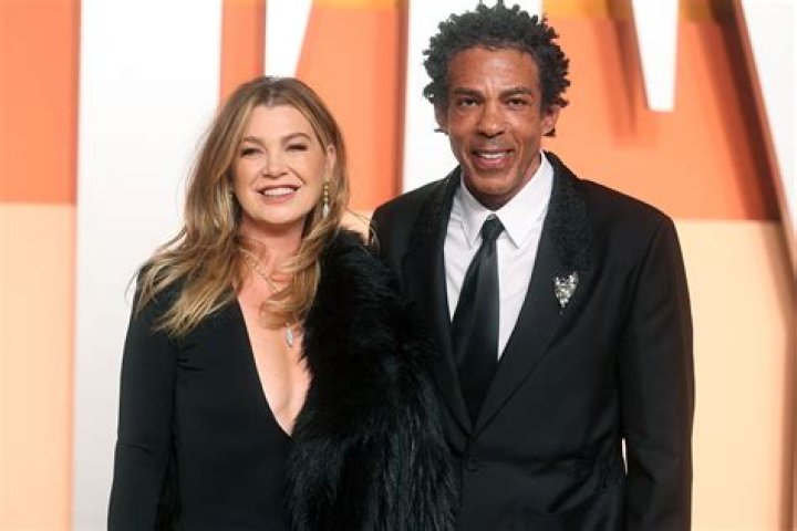 Ellen Pompeo & Husband Chris Ivery at a 2009 NBA Game