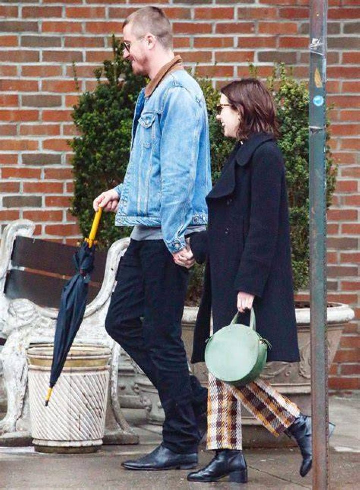 Emma Roberts Holds Hands With New Man At Paris Fashion Week 5 Months After Split From Garrett Hedlund