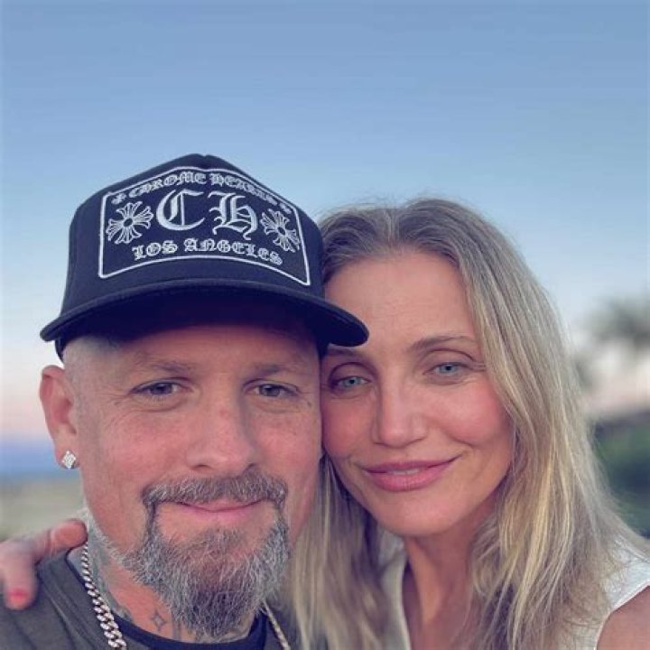 EXCLUSIVE: Cameron Diaz and her husband Benji Madden arrive in the South of France with toddler daughter Raddix for Sofia Richie&rsquo;s lavish upcoming wedding. The Hollywood couple were spotted in Antibes, French Riviera, on Thursday after jetting in for the ultra glamorous affair. Sofia is part of the couple's wider family, with Benji&rsquo;s twin bother Joel being married to her sister, fashion designer Nicole Richie. After touching down, A-list actress Cameron, 50, looked radiant in a simple jeans and white sweater combo as she cuddled their three-year-old on the steps of the palatial Hotel du Cap Eden Roc. Her 'Good Charlotte' musician beau, 44, was all smiles in a black hoodie and baseball hat. Model Sofia, the daughter of legendary crooner Lionel Richie, is set to tie the knot with British music executive Elliott Grainge, 30, in front of a star-studded crowd this weekend. 20 Apr 2023 Pictured: Cameron Diaz, Benji Madden, Raddix. Photo credit: EliotPress / MEGA TheMegaAgency.com +1 888 505 6342 (Mega Agency TagID: MEGA971281_007.jpg) [Photo via Mega Agency]