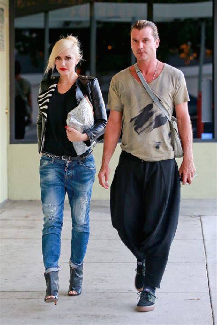 EXCLUSIVE: Gwen Stefani and Gavin Rossdale have a rare co-parenting bonding moment together at the end of Apollo's flag football game while both consoling their youngest son after his team suffered a tough loss in Los Angeles on Sunday. Gwen went to the game solo without Blake Shelton and sat in the stands with other parents while Gavin rooted from the sidelines with his girlfriend Courtlyn Cannan who he brought to the game. They ignored each other the whole game until after the match when they both wanted to console their crying son Apollo who was upset about losing his flag football contest. 16 Oct 2022 Pictured: Gwen Stefani and Gavin Rossdale having a co-parenting bonding moment together at the end of Apollo's football game. Photo credit: Garrett Press / MEGA TheMegaAgency.com +1 888 505 6342 (Mega Agency TagID: MEGA908631_001.jpg) [Photo via Mega Agency]