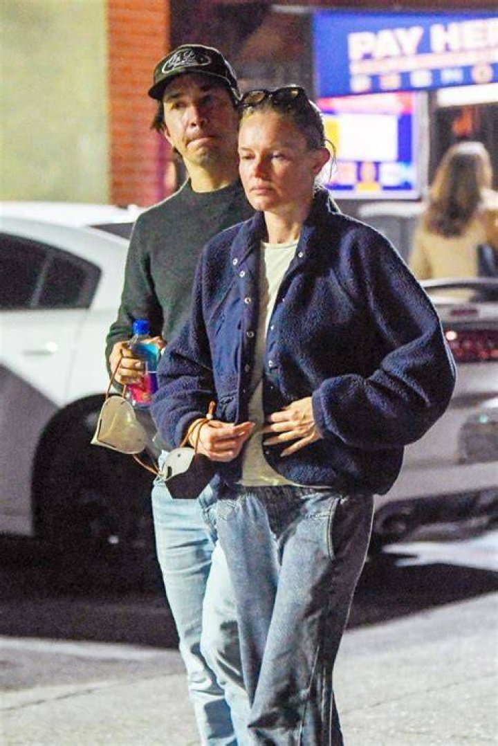 EXCLUSIVE: Kate Bosworth and her beau Justin Long step out in Pasadena after sparking engagement rumors over the weekend. The couple were seen heading to a sushi restaurant. Kate wore an oversized sweater and jeans and kept her look incognito with a black facemask. Justin was all smiles and put his arm around his lady as they stepped out on the town. 15 Mar 2023 Pictured: Kate Bosworth and Justin Long. Photo credit: MEGA TheMegaAgency.com +1 888 505 6342 (Mega Agency TagID: MEGA956730_014.jpg) [Photo via Mega Agency]
