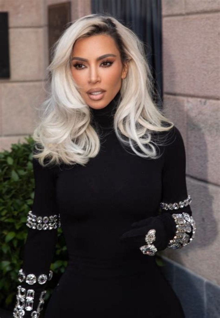 *EXCLUSIVE* MILAN, ITALY - Kim Kardashian leaves dinner in Milan with Khloe and North wearing the final runway look from her critically acclaimed fashion show with Dolce and Gabbana during Milan Fashion Week that she curated and creative directed. Pictured: Kim Kardashian BACKGRID USA 25 SEPTEMBER 2022 BYLINE MUST READ: COBRA TEAM / BACKGRID USA: +1 310 798 9111 / UK: +44 208 344 2007 / *UK Clients - Pictures Containing Children Please Pixelate Face Prior To Publication*