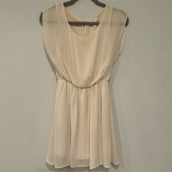 Flowy beige dress.