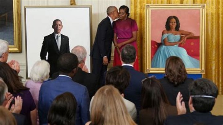 Former President Barack Obama kisses his wife former first lady Michelle Obama after they unveiled their official White House portraits during a ceremony for the unveiling in the East Room of the White House, in Washington Biden Obama Portraits, Washington, United States - 07 Sep 2022