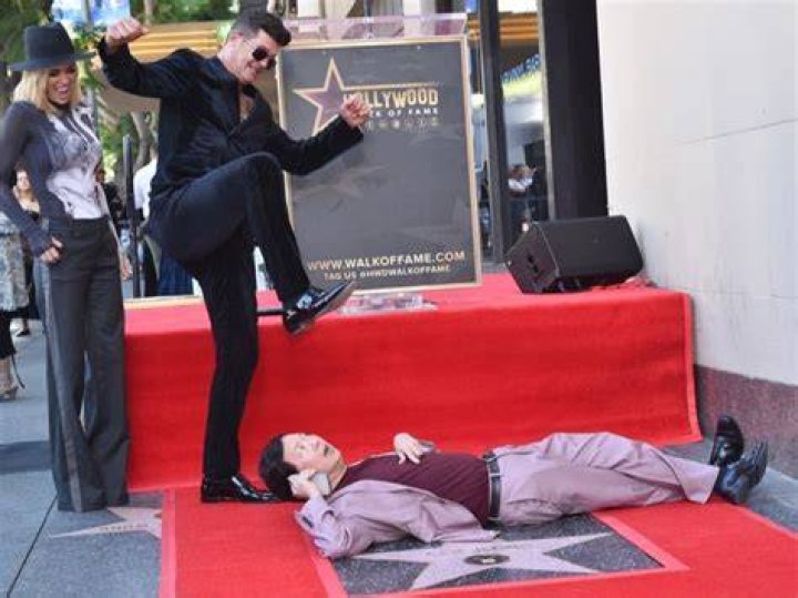 From left, Robin Thicke and Paula Patton arrive at the 56th annual GRAMMY Awards at Staples Center, in Los Angeles The 56th Annual GRAMMY Awards - Arrivals, Los Angeles, USA