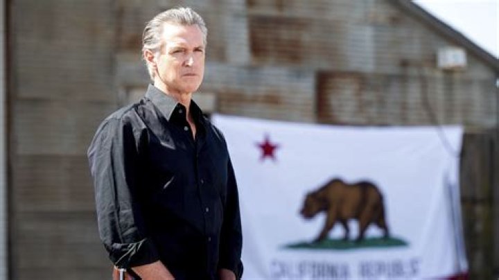 Gavin Newsom stands