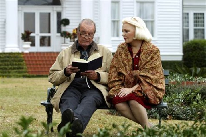 Gena Rowlands in front of a Notebook billboard