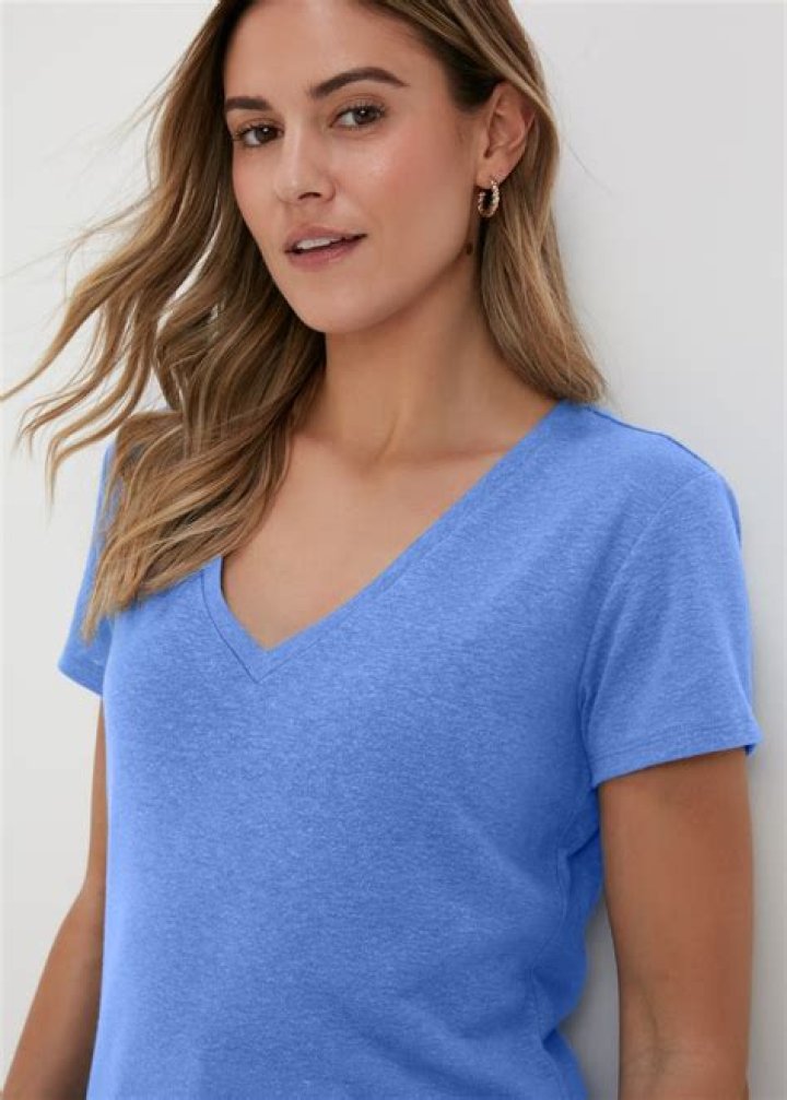 Girl wearing light blue v-neck