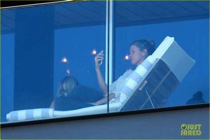 Gisele Bundchen waves to fans at the Super Bowl
