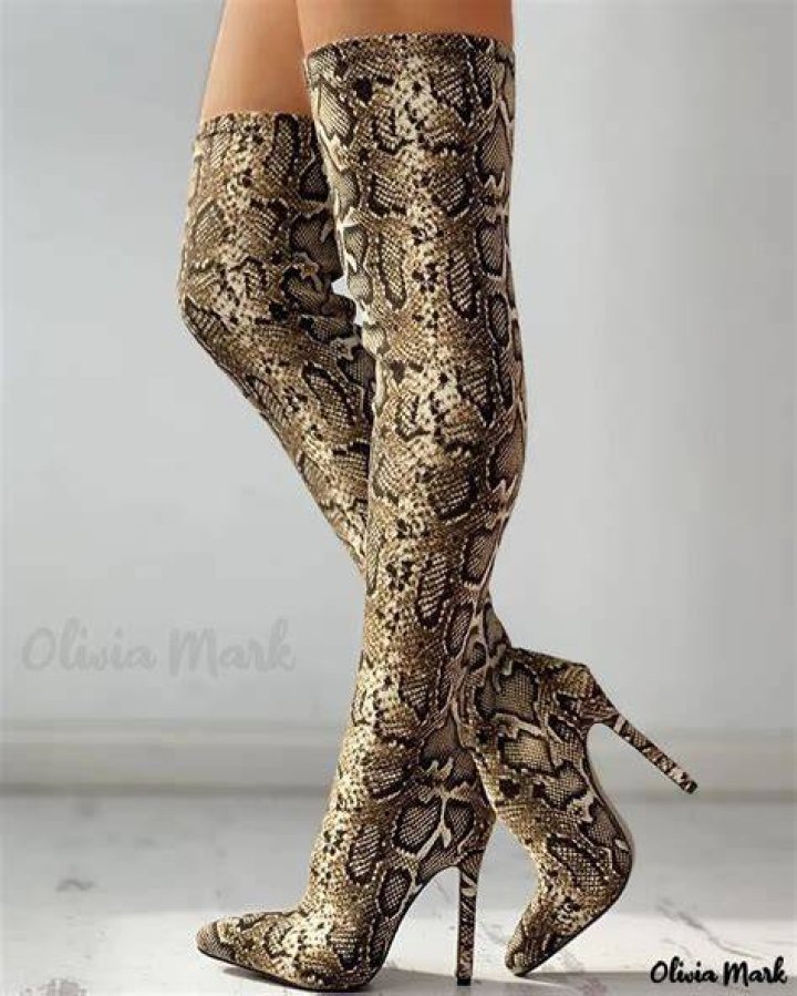 Hailie Scott Mathers, 24, Jokes About Coronavirus While Rocking Thigh-High Snakeskin Boots