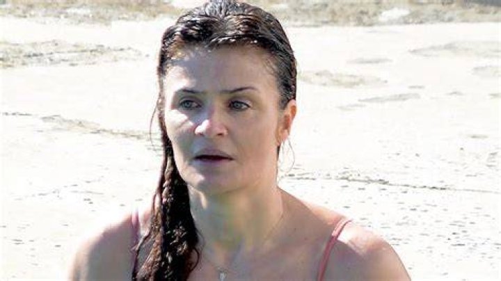 Helena Christensen, 53, Rocks Majorly Plunging Black Swimsuit To End 2021 — Photo
