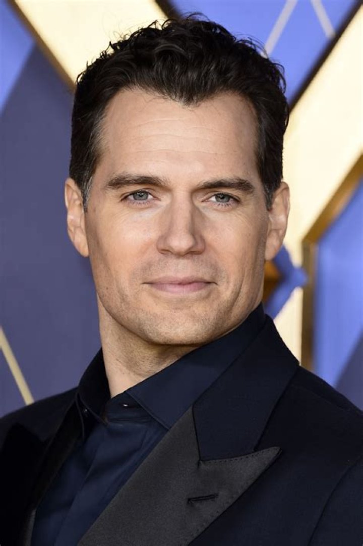 Henry Cavill walks in the water