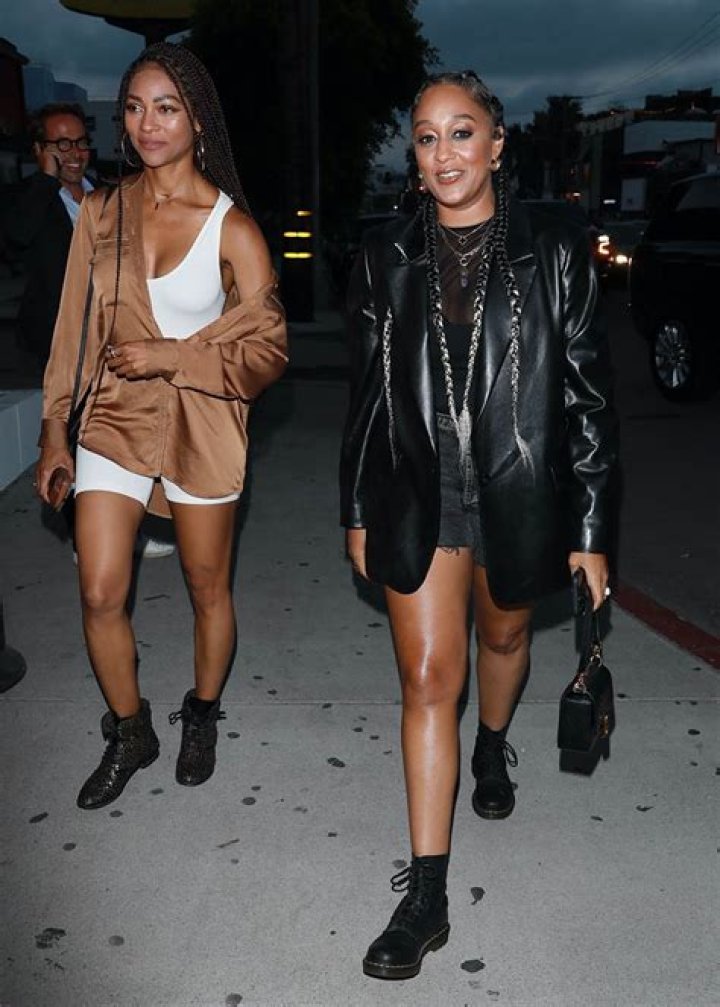 Hollywood, CA - *EXCLUSIVE* - A pregnant Ireland Baldwin rocks a pink wig as she and boyfriend RAC are seen arriving at an adult entertainment club called Jumbo's Clown Room to celebrate her baby shower with celebrity friends such as Hilary Duff, Rumer Willis, mom Kim Basinger and many other friends as well in Hollywood. The 27-year-old mom to be is wearing a see through lingerie, pink cowboy style boots and a pink wig. At one point, you can clearly see Ireland's pink under garment through the back of her lingerie as she walks into the club. The Jumbo's Clown Room is usually closed on Monday's but certain arrangements were made for it to be open for Ireland Baldwin's baby shower celebration. Pictured: Ireland Baldwin, RAC BACKGRID USA 7 MARCH 2023 USA: +1 310 798 9111 / UK: +44 208 344 2007 / *UK Clients - Pictures Containing Children Please Pixelate Face Prior To Publication*